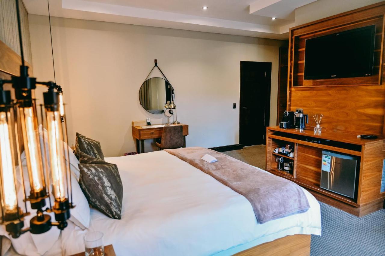 Tredenham Boutique Hotel Bloemfontein Exterior foto A room at the hotel